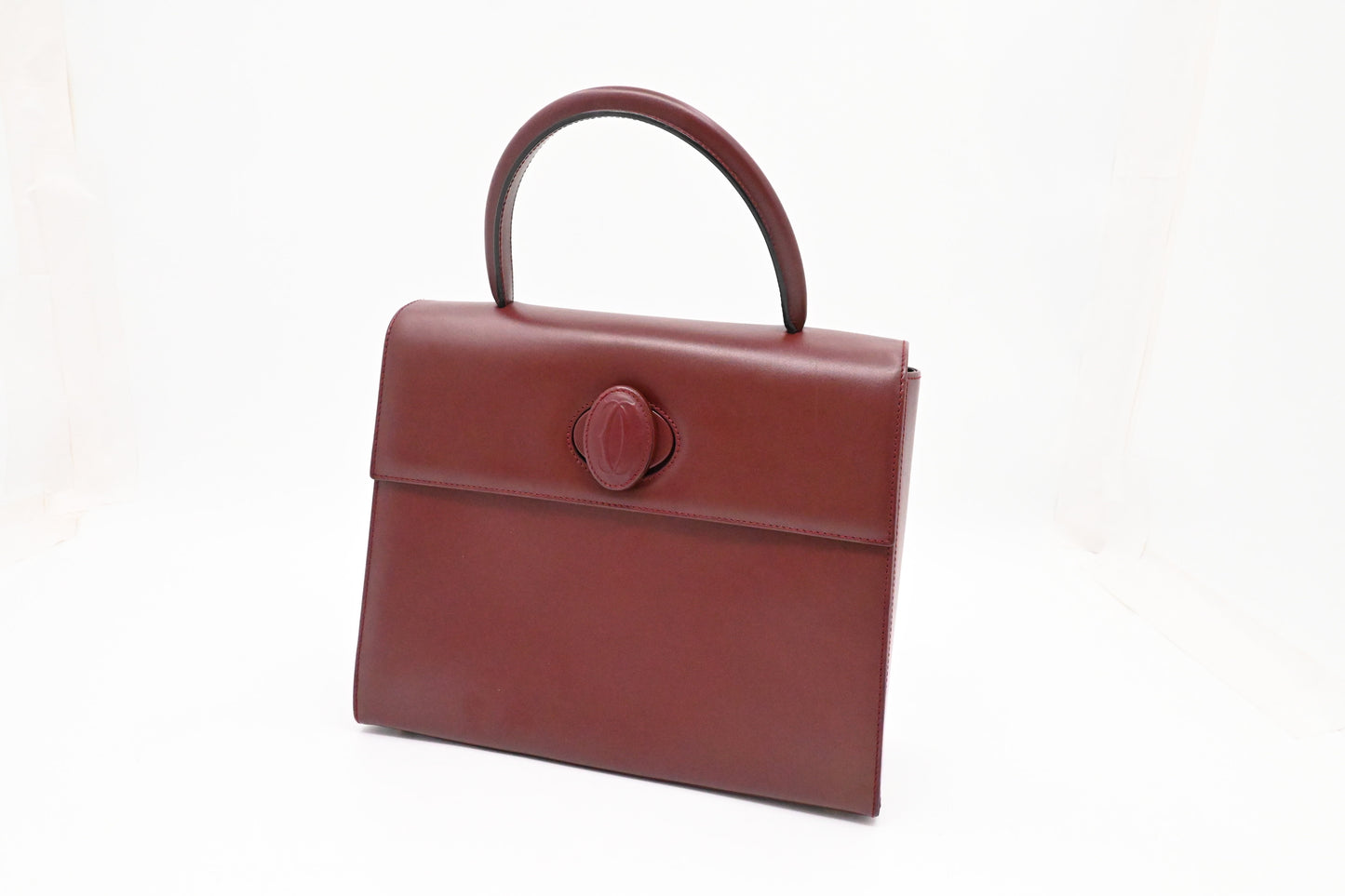 Cartier Top Handbag in Burgundy Leather