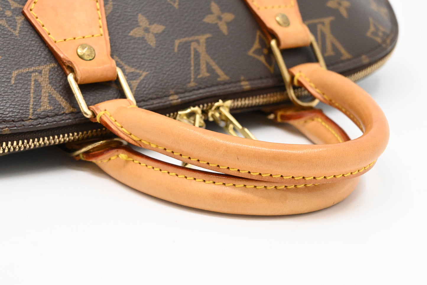 Louis Vuitton Alma PM in Monogram Canvas