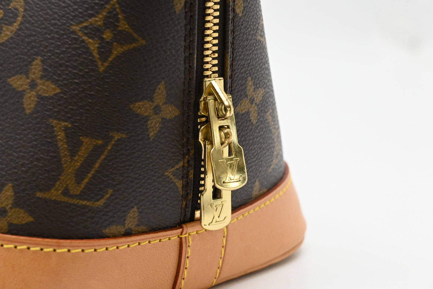 Louis Vuitton Alma PM in Monogram Canvas