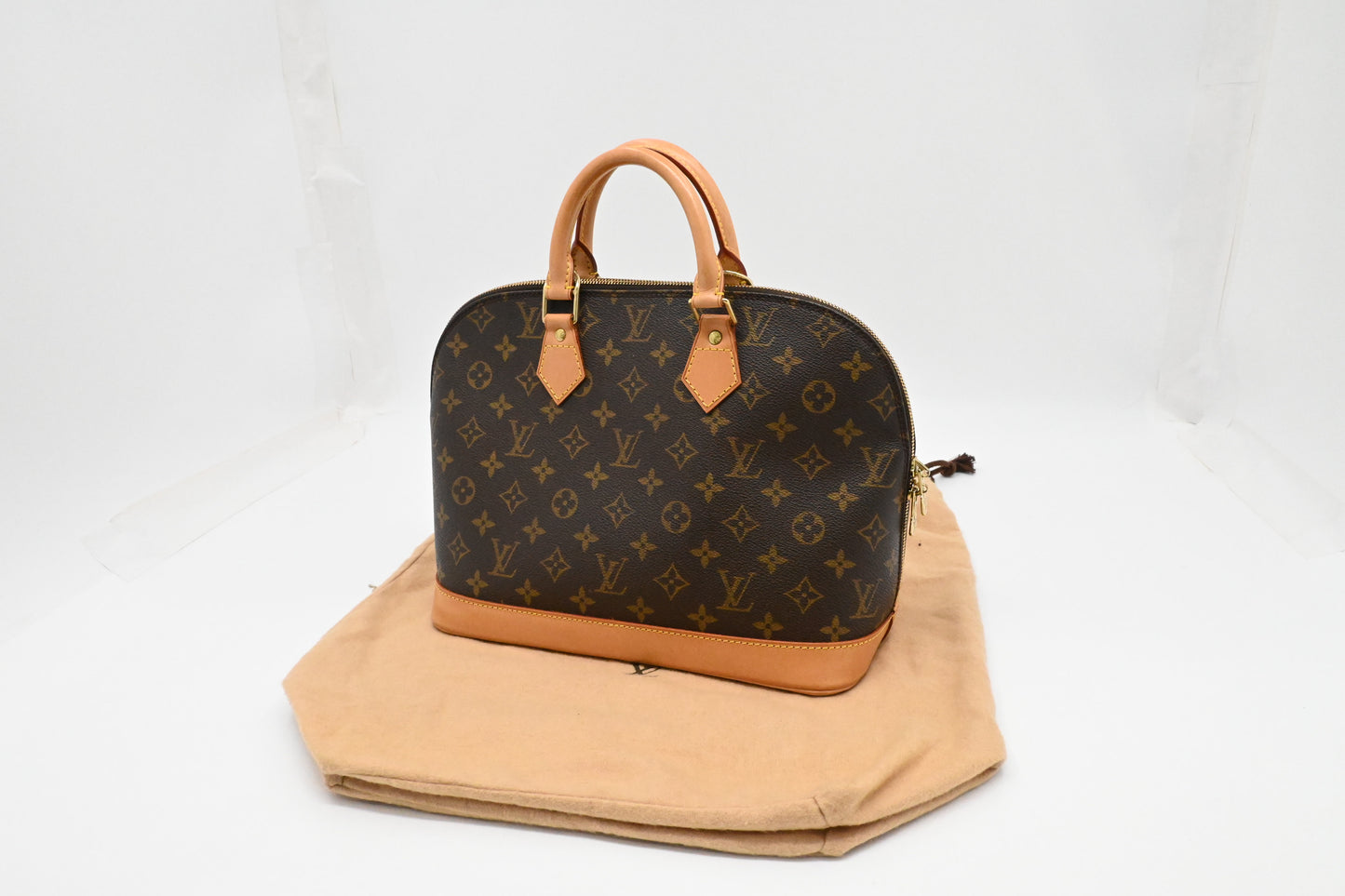 Louis Vuitton Alma PM in Monogram Canvas