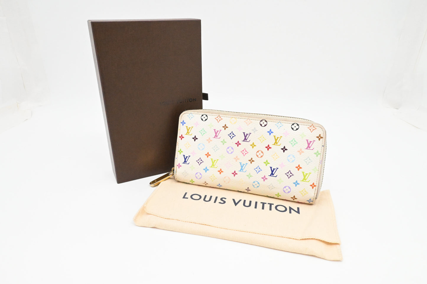 Louis Vuitton Long Zippy Wallet in White Multicolor Canvas