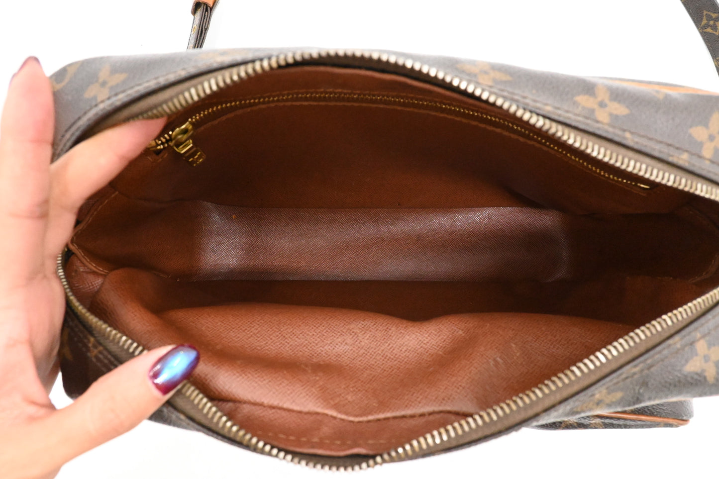 Louis Vuitton Nile PM in Monogram Canvas