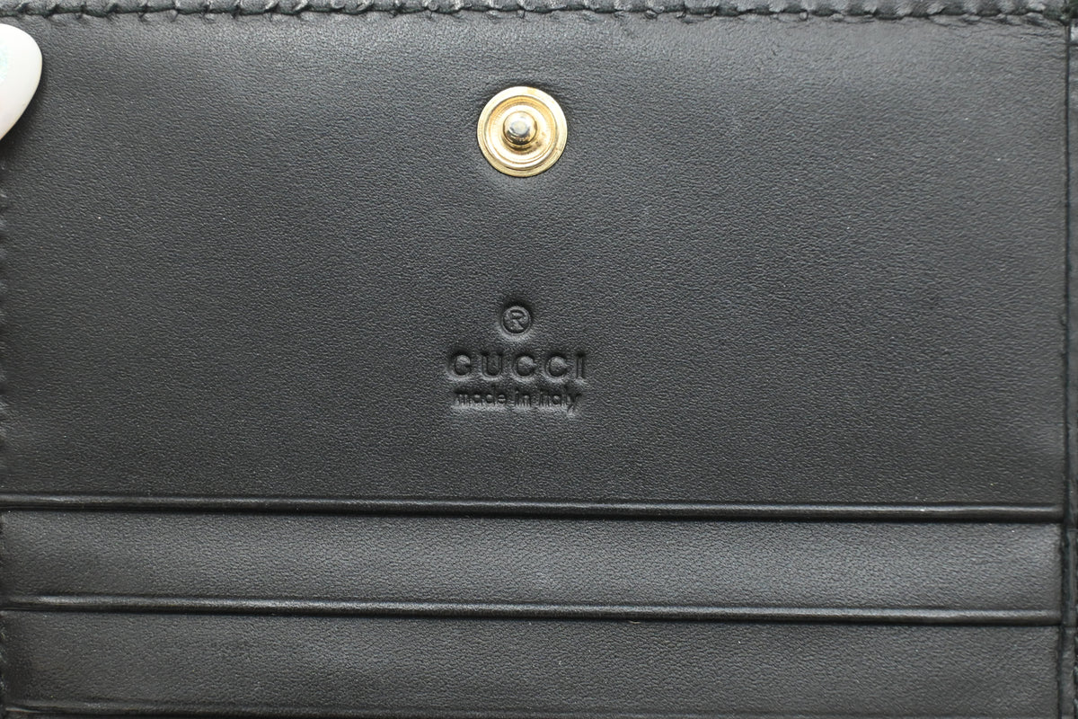 Gucci Compact Wallet in Black Guccissima Leather