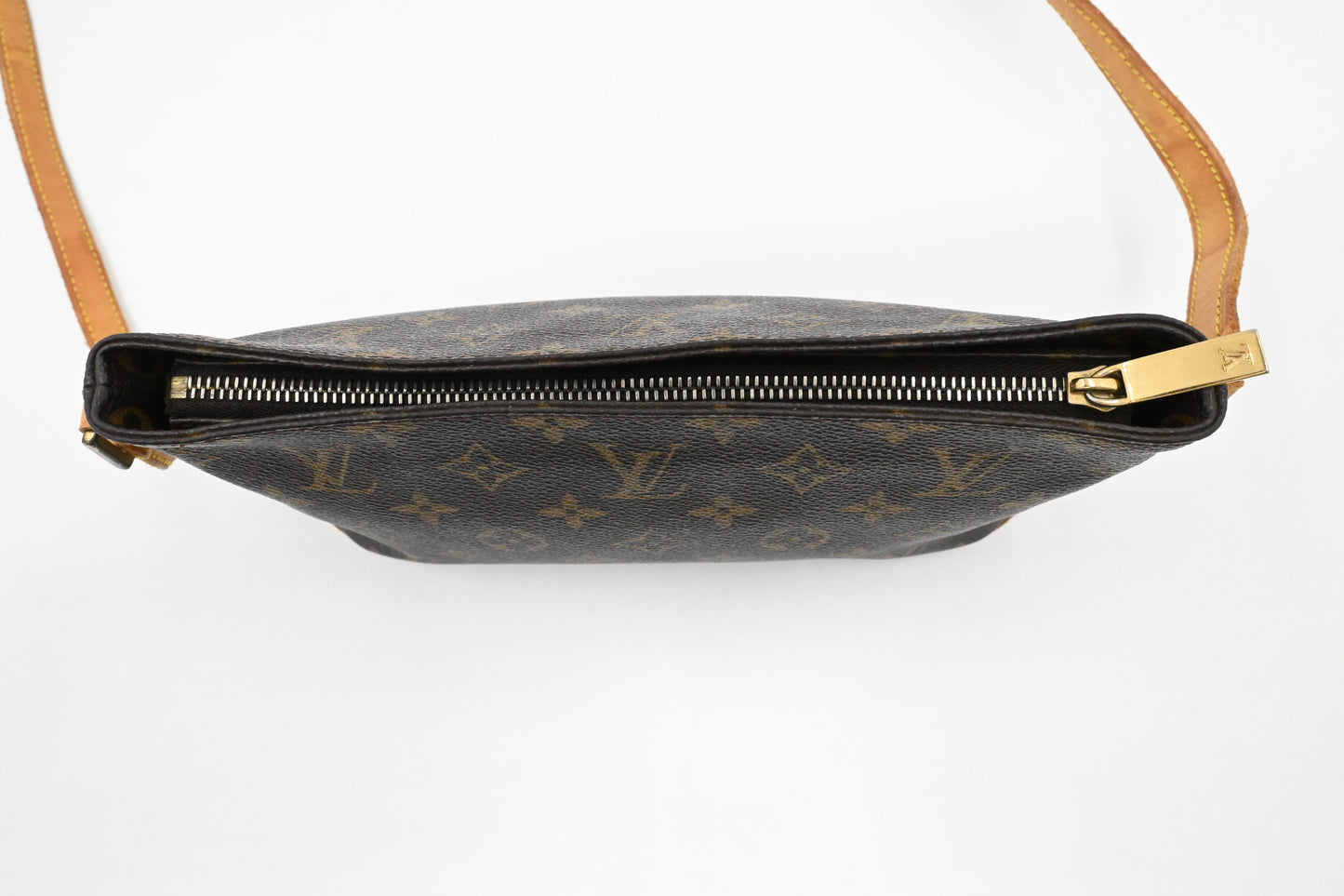 Louis Vuitton Trotteur in Monogram Canvas