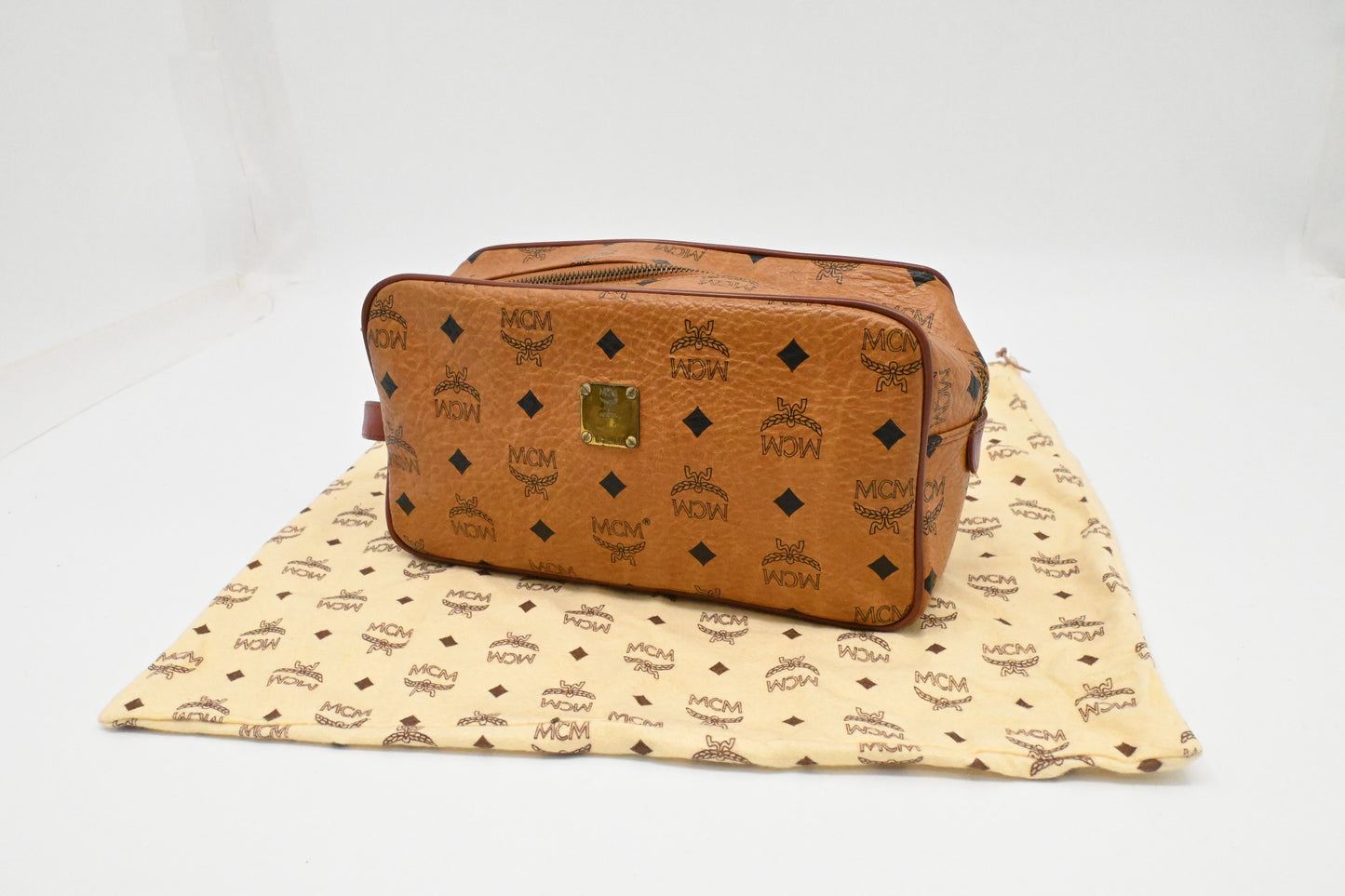 MCM Handle Pouch in Cognac Visetos Canvas