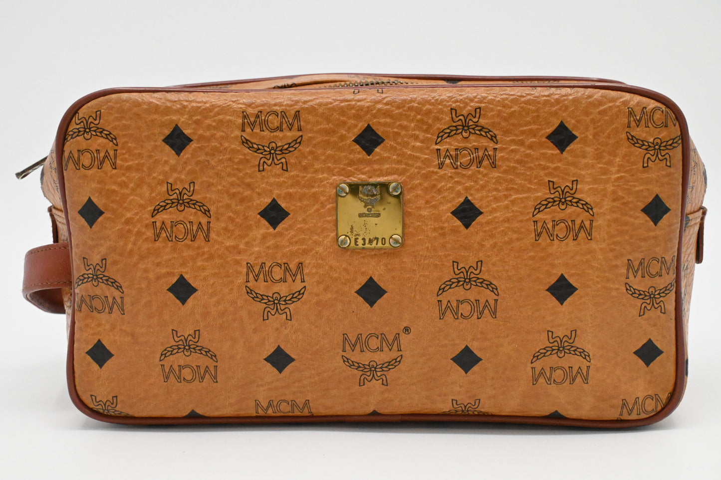 MCM Handle Pouch in Cognac Visetos Canvas