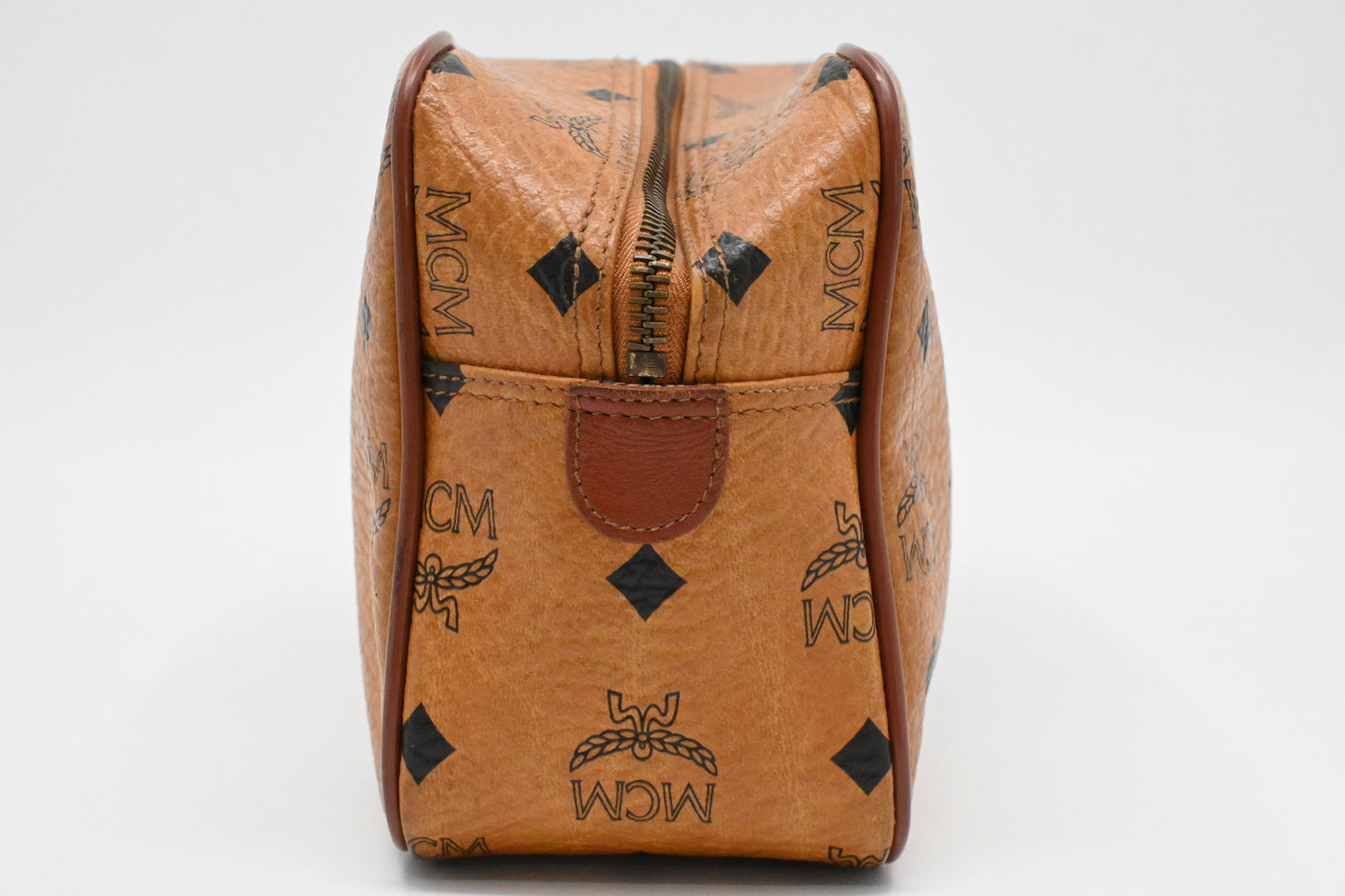 MCM Handle Pouch in Cognac Visetos Canvas