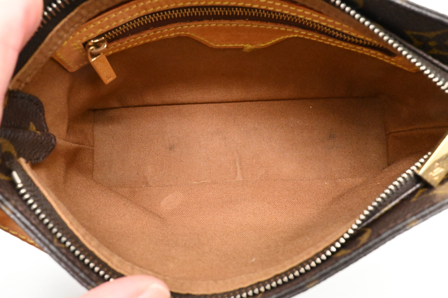 Louis Vuitton Trotteur in Monogram Canvas