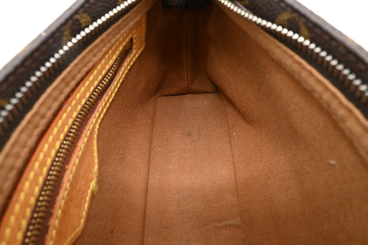 Louis Vuitton Trotteur in Monogram Canvas