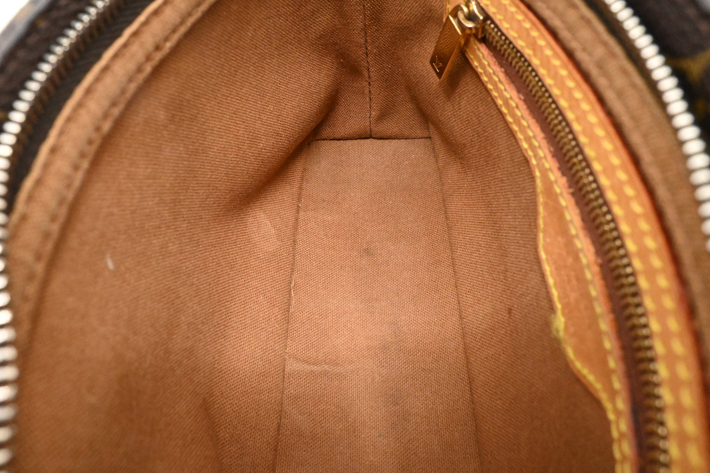 Louis Vuitton Trotteur in Monogram Canvas