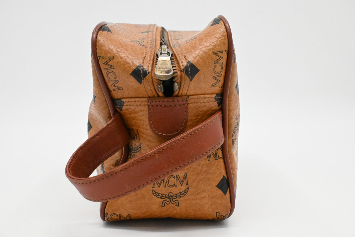 MCM Handle Pouch in Cognac Visetos Canvas