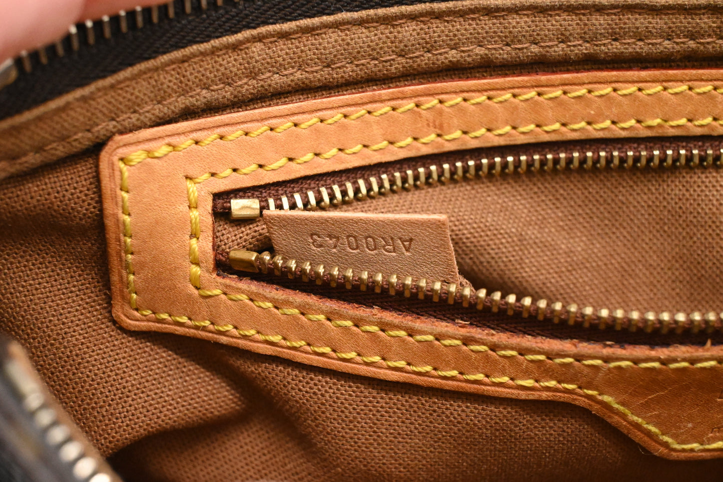 Louis Vuitton Trotteur in Monogram Canvas