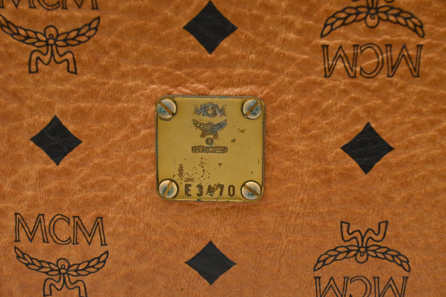 MCM Handle Pouch in Cognac Visetos Canvas