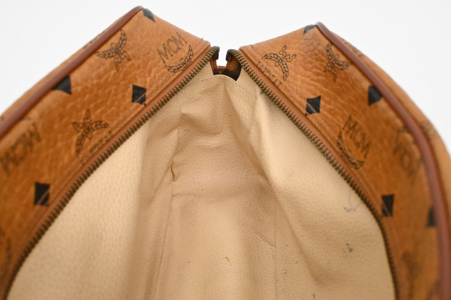 MCM Handle Pouch in Cognac Visetos Canvas