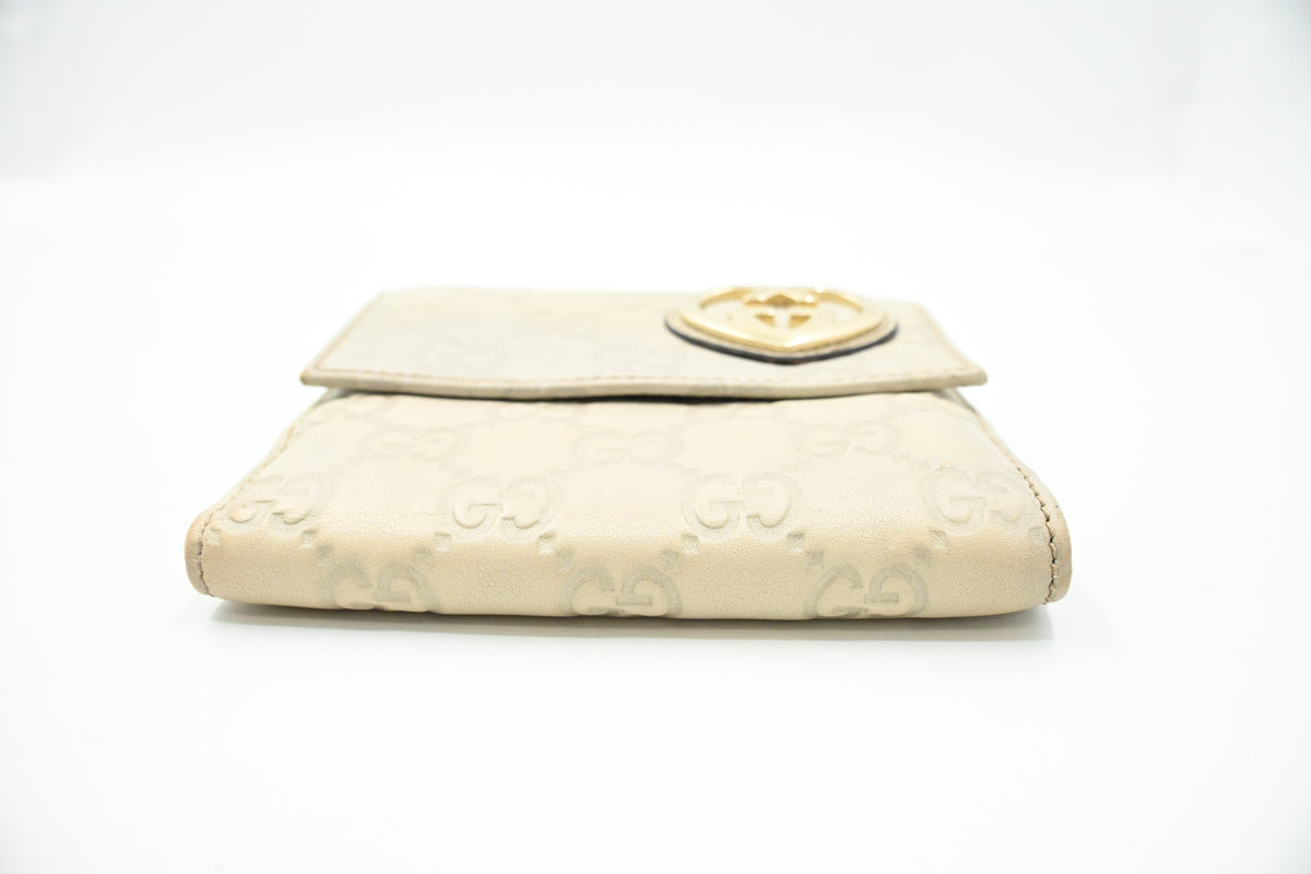 Gucci Heart Compact Wallet in White Guccissima Leather
