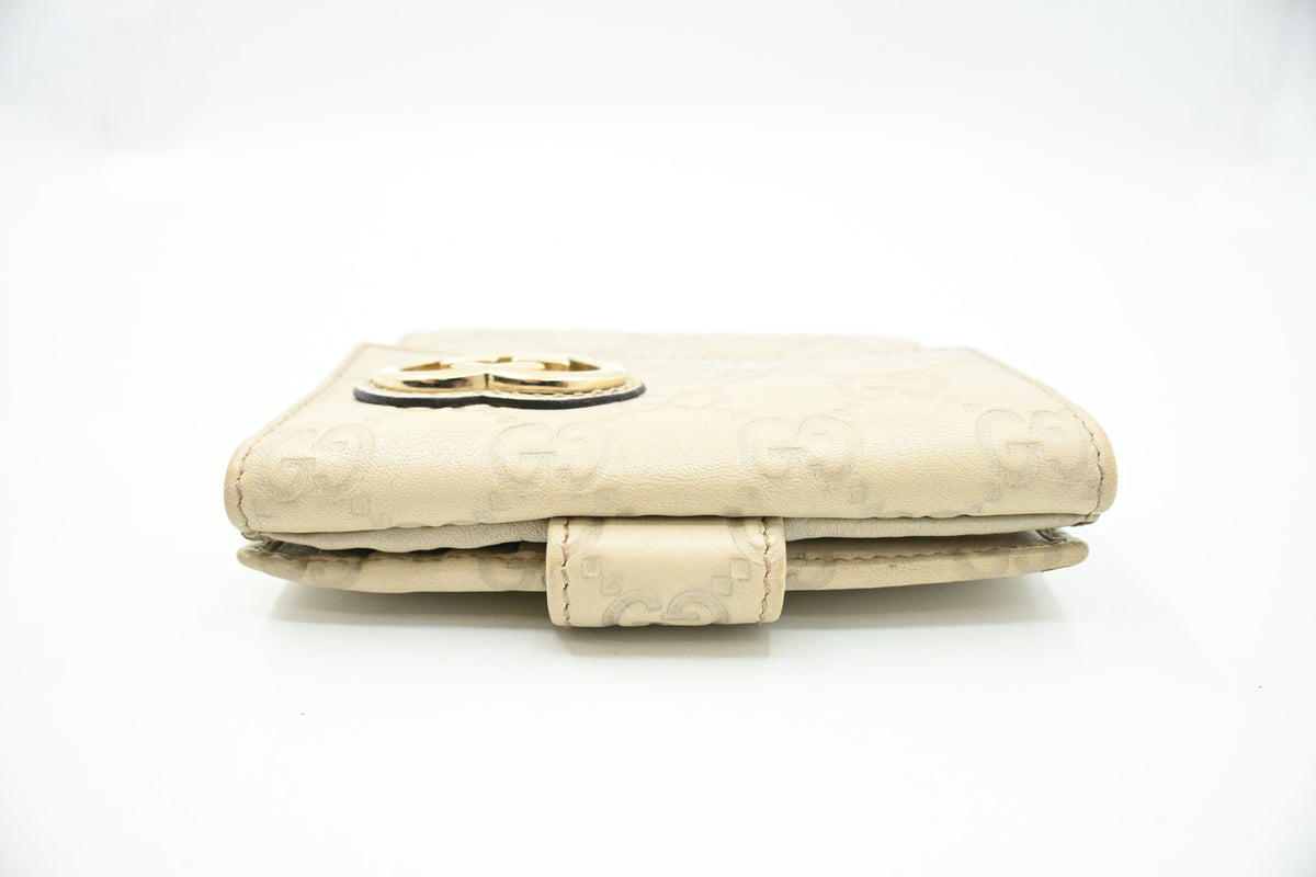 Gucci Heart Compact Wallet in White Guccissima Leather