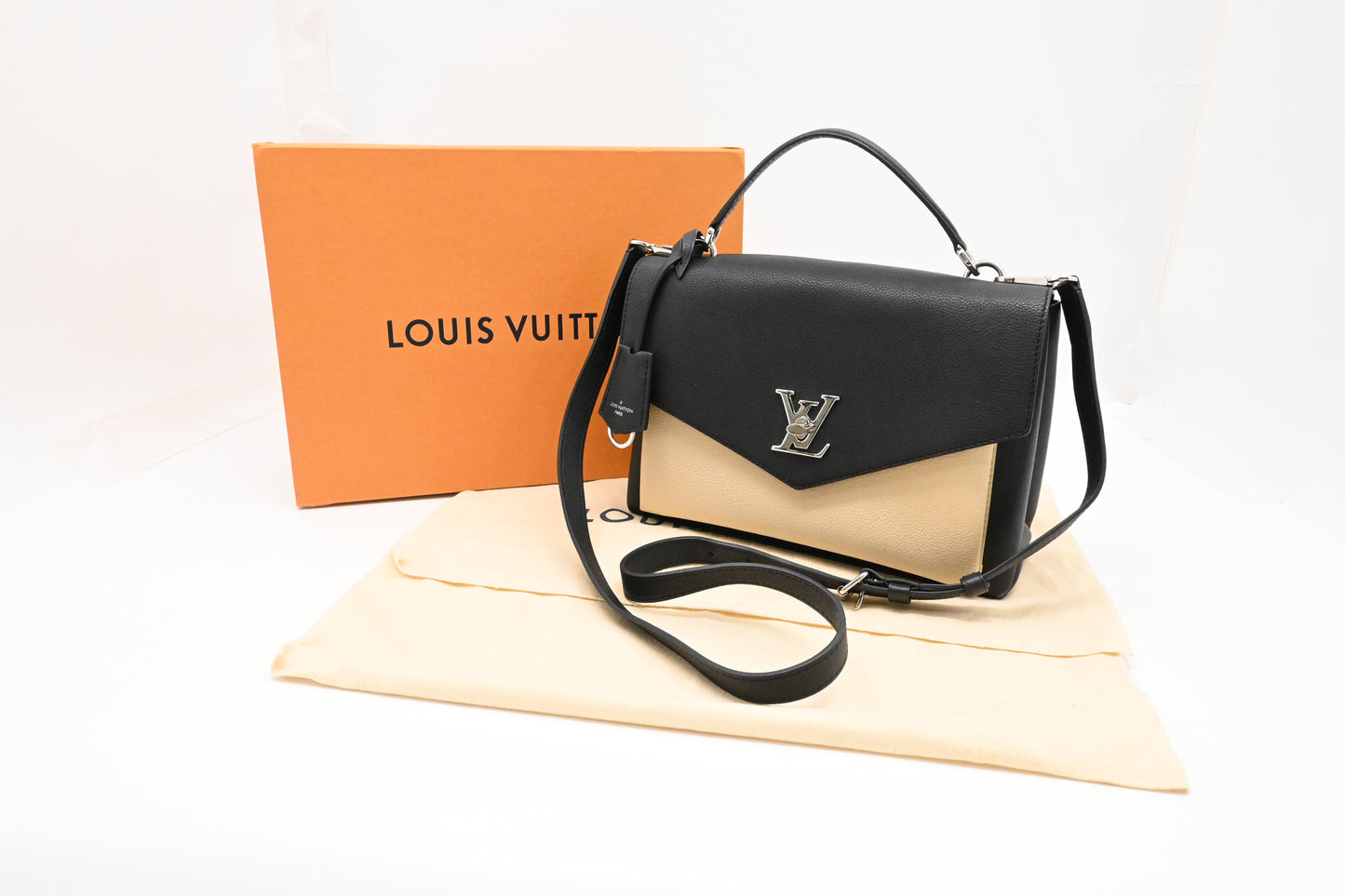 Louis Vuitton MyLockMe in Black and Cream Leather