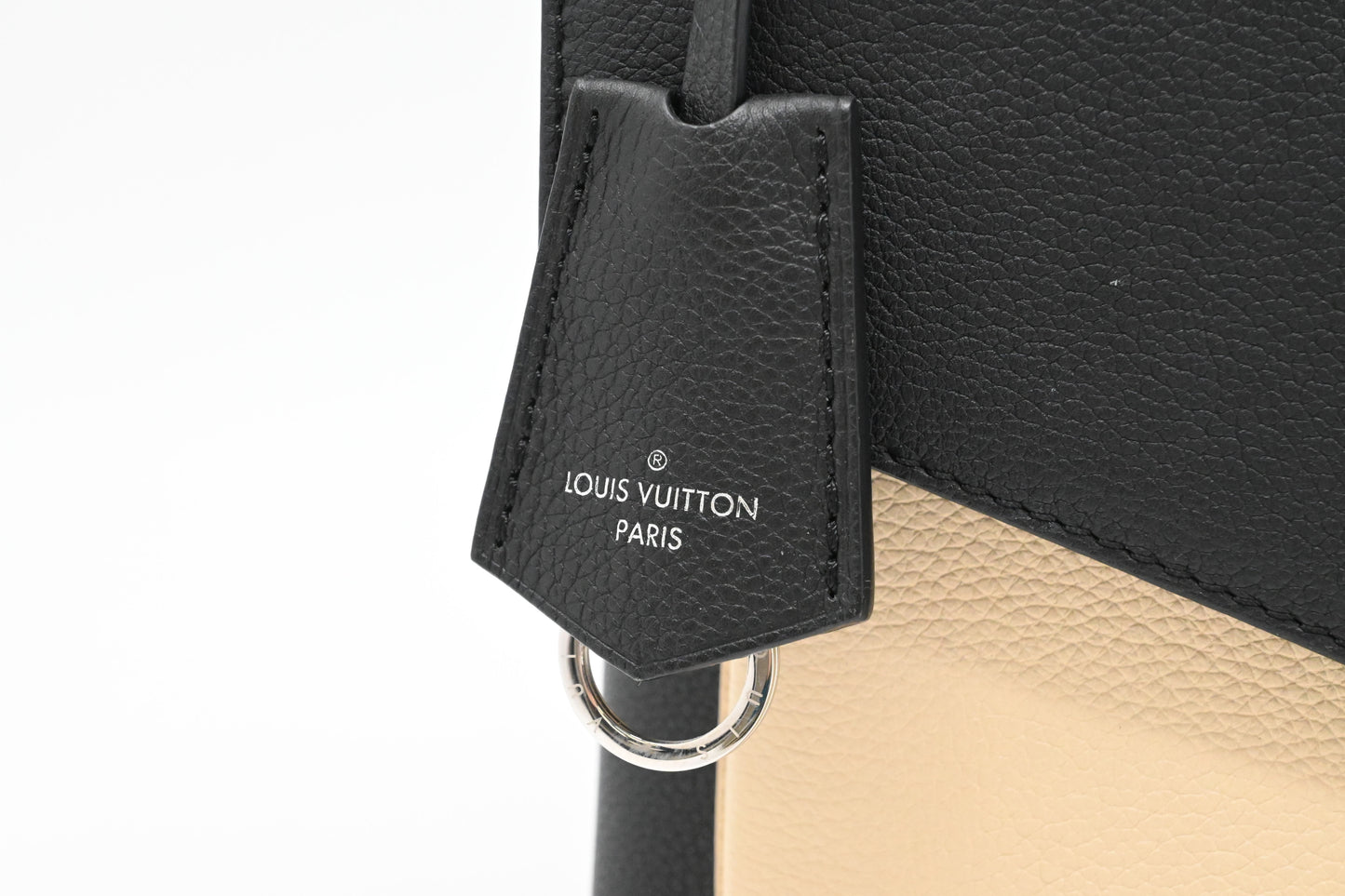 Louis Vuitton MyLockMe in Black and Cream Leather