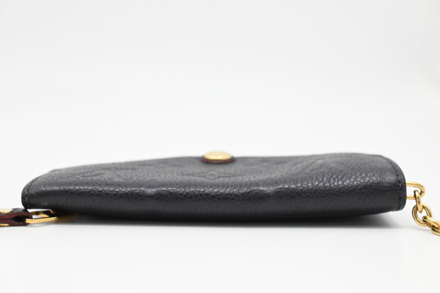 Louis Vuitton Pochette Cles in Marine Rouge Empreinte Leather