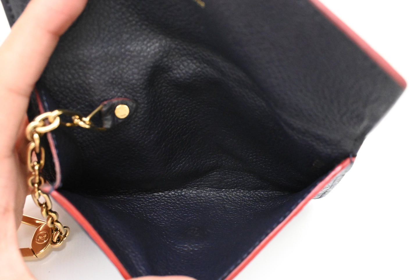 Louis Vuitton Pochette Cles in Marine Rouge Empreinte Leather