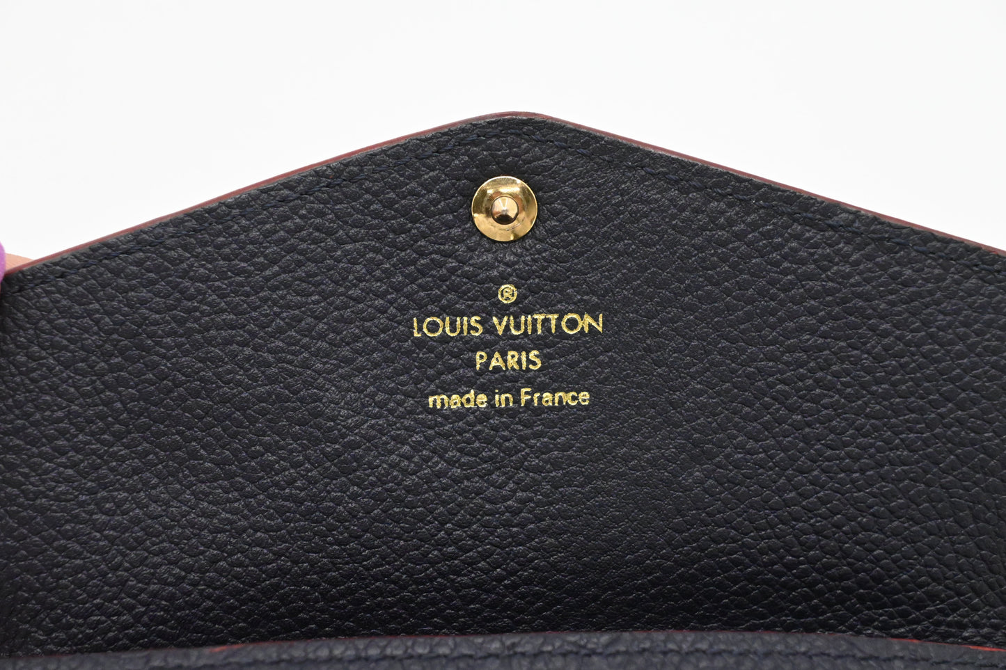 Louis Vuitton Pochette Cles in Marine Rouge Empreinte Leather