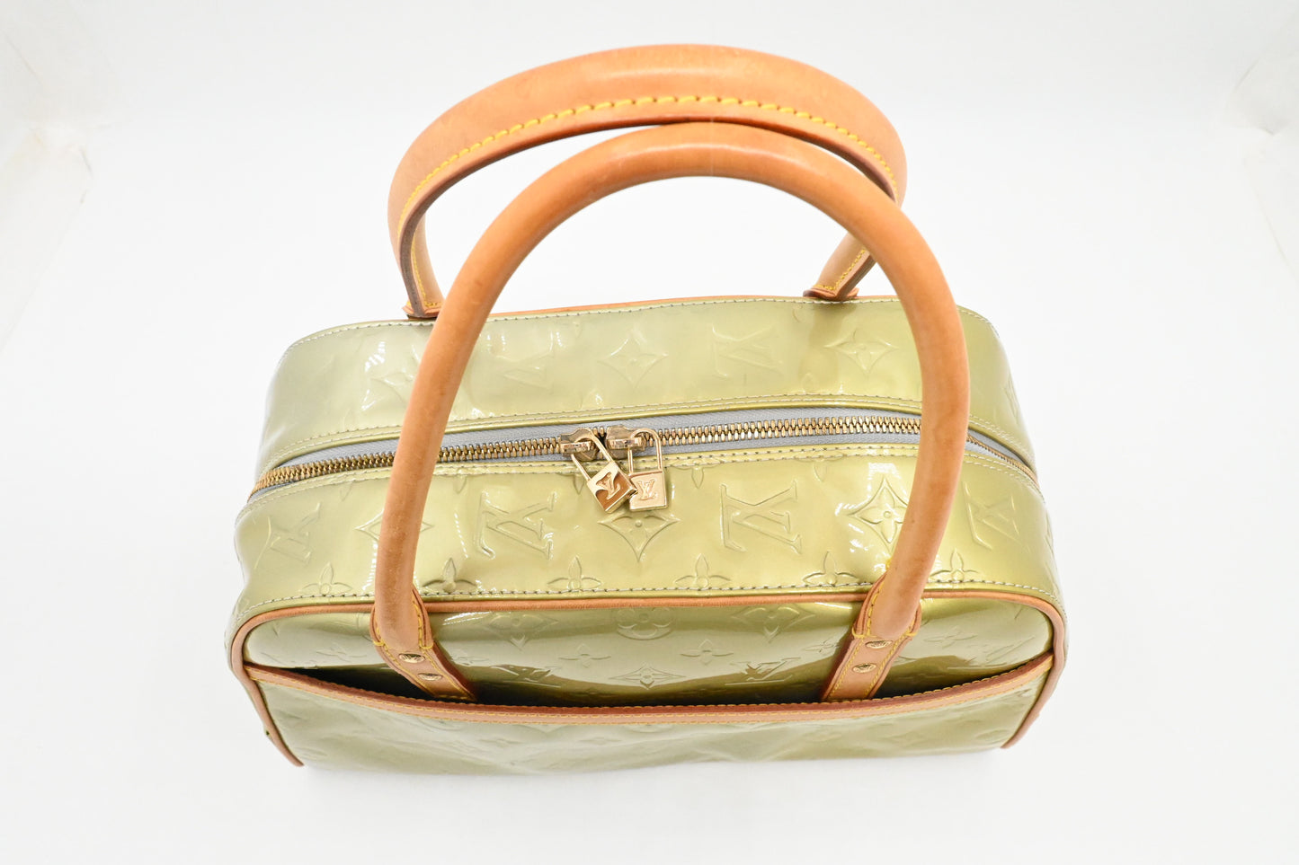 Louis Vuitton Tompkins in Green Metallic Vernis Leather