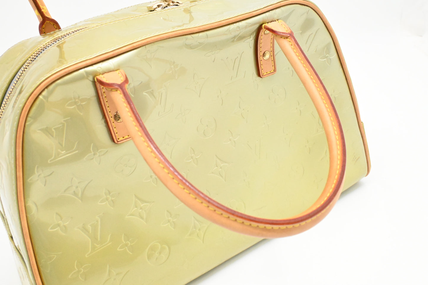 Louis Vuitton Tompkins in Green Metallic Vernis Leather