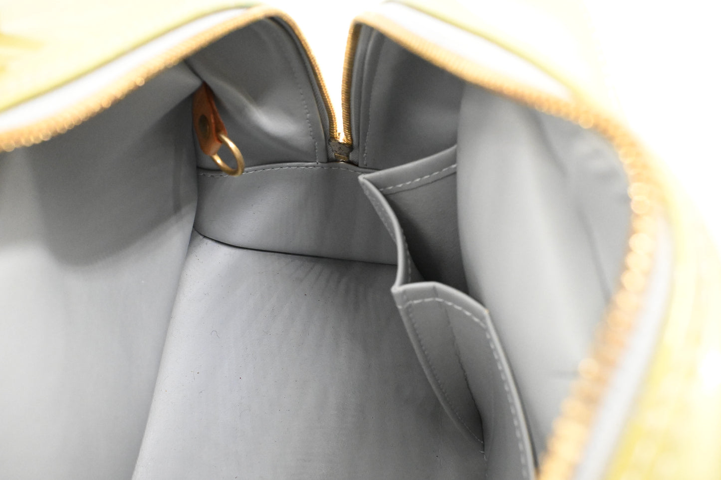 Louis Vuitton Tompkins in Green Metallic Vernis Leather