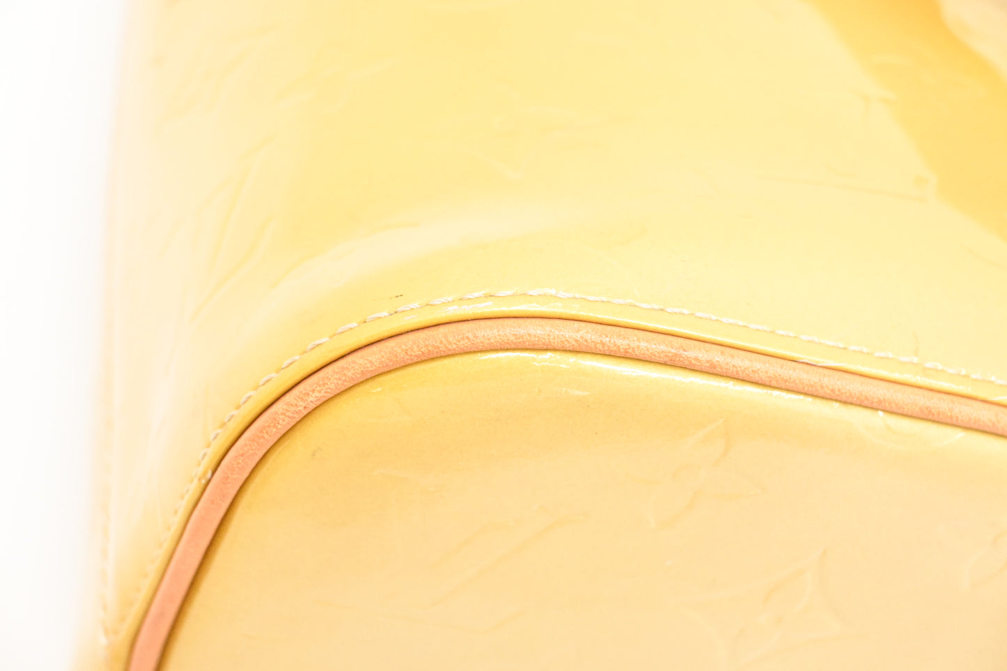 Louis Vuitton Houston in Yellow Vernis Leather