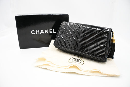 Chanel Chevron Clutch in Black Patent Leather