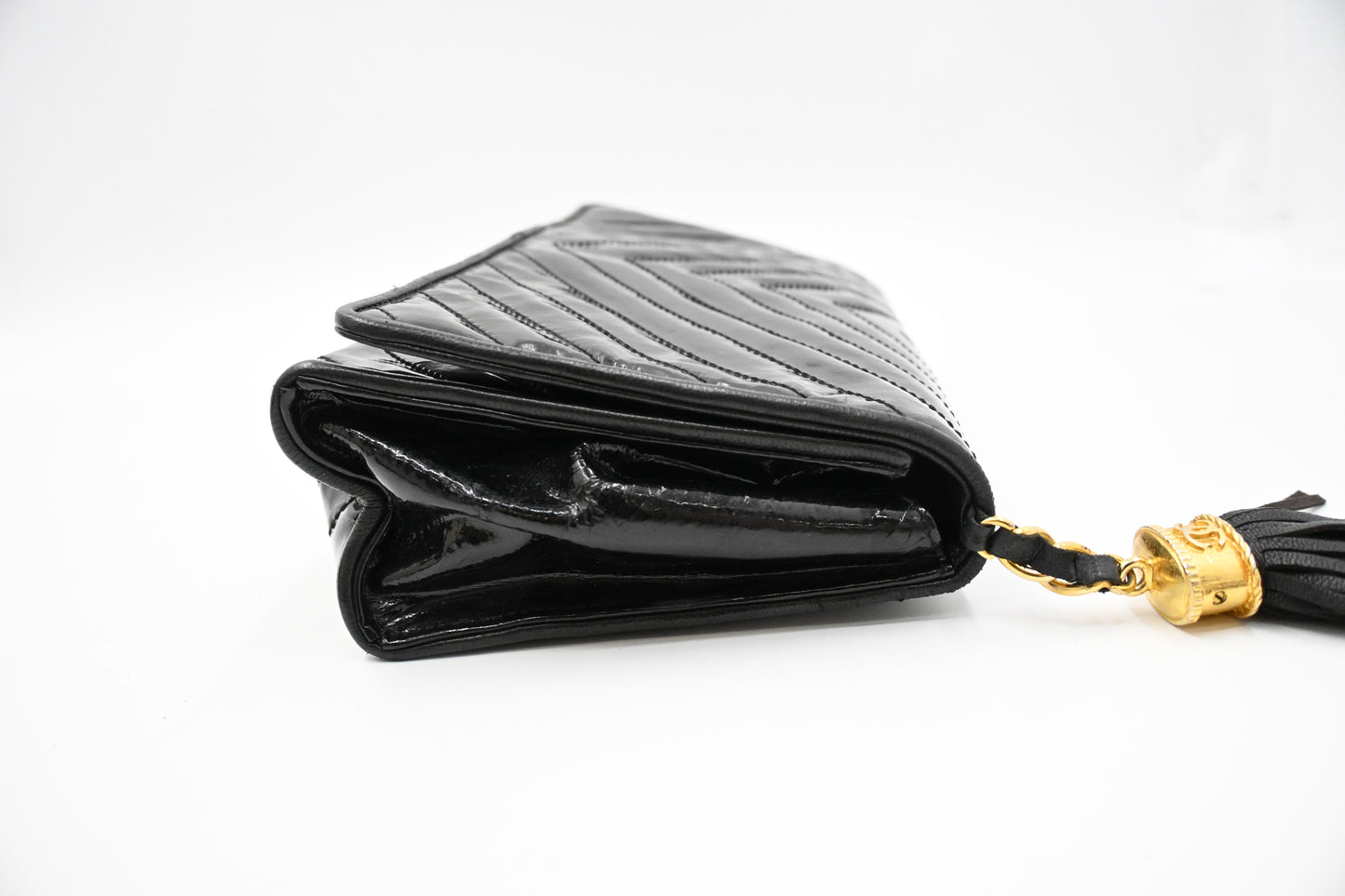 Chanel Chevron Clutch in Black Patent Leather