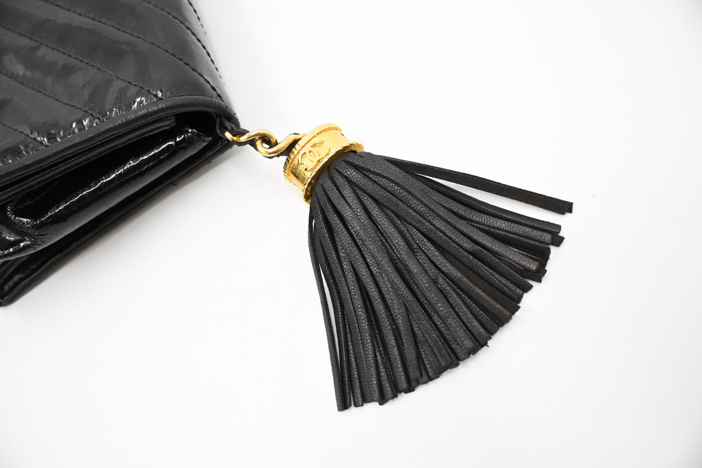 Chanel Chevron Clutch in Black Patent Leather