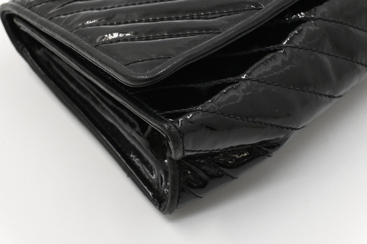 Chanel Chevron Clutch in Black Patent Leather