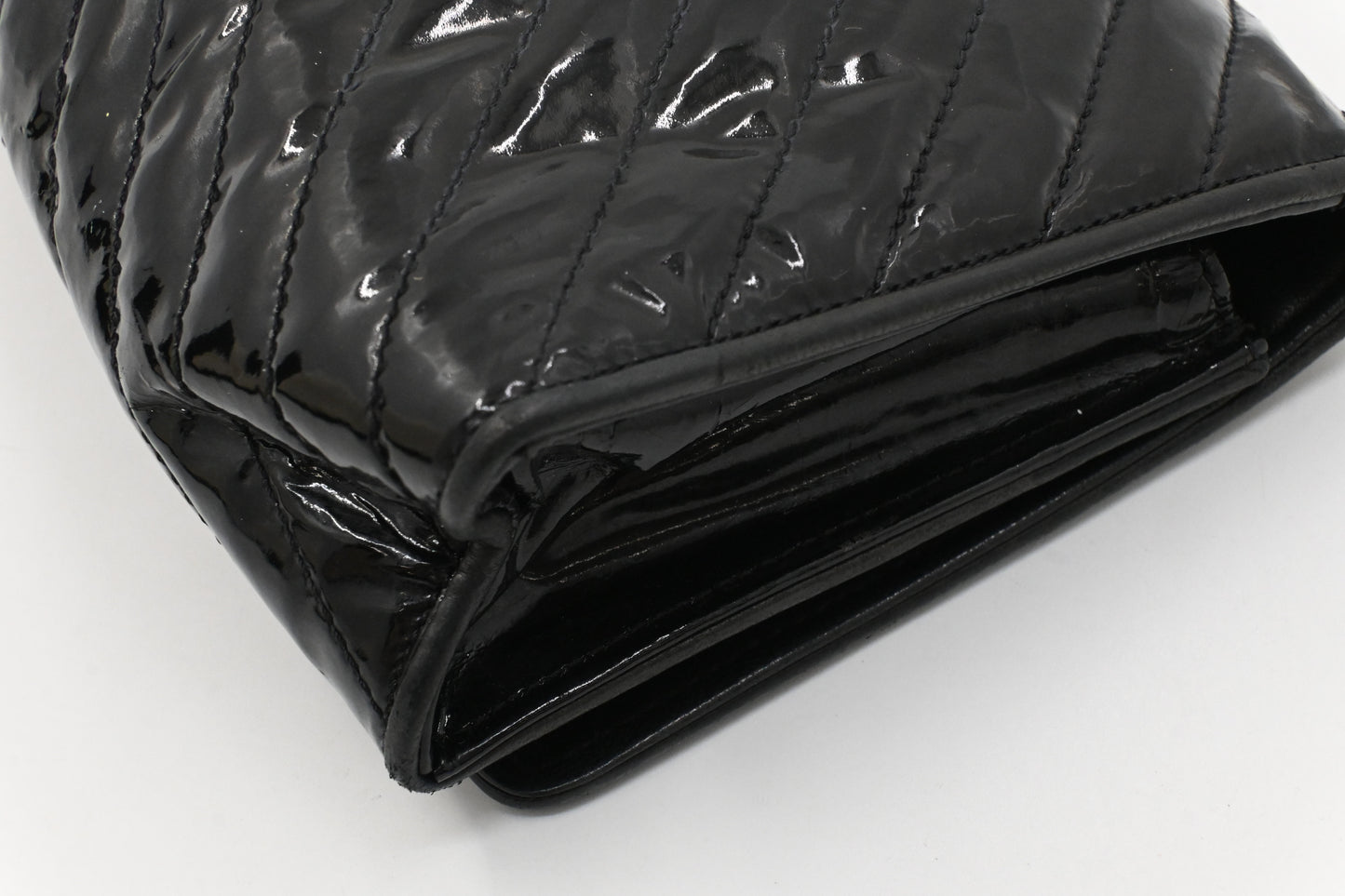 Chanel Chevron Clutch in Black Patent Leather