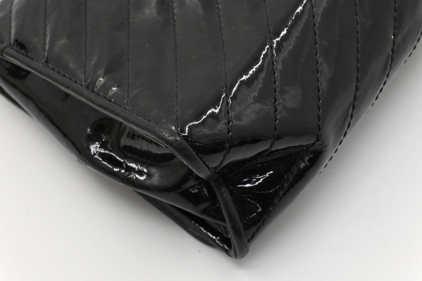 Chanel Chevron Clutch in Black Patent Leather