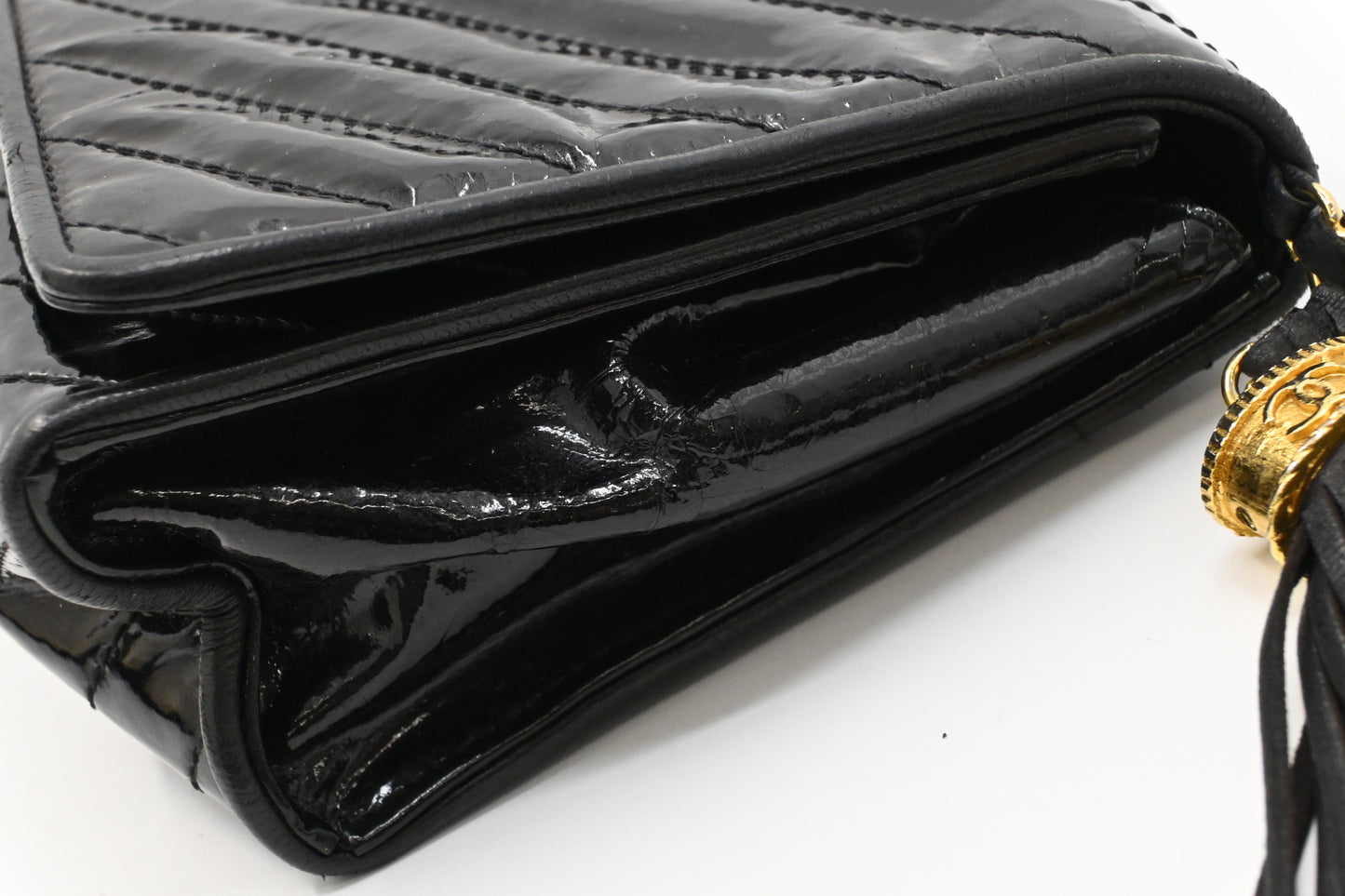 Chanel Chevron Clutch in Black Patent Leather