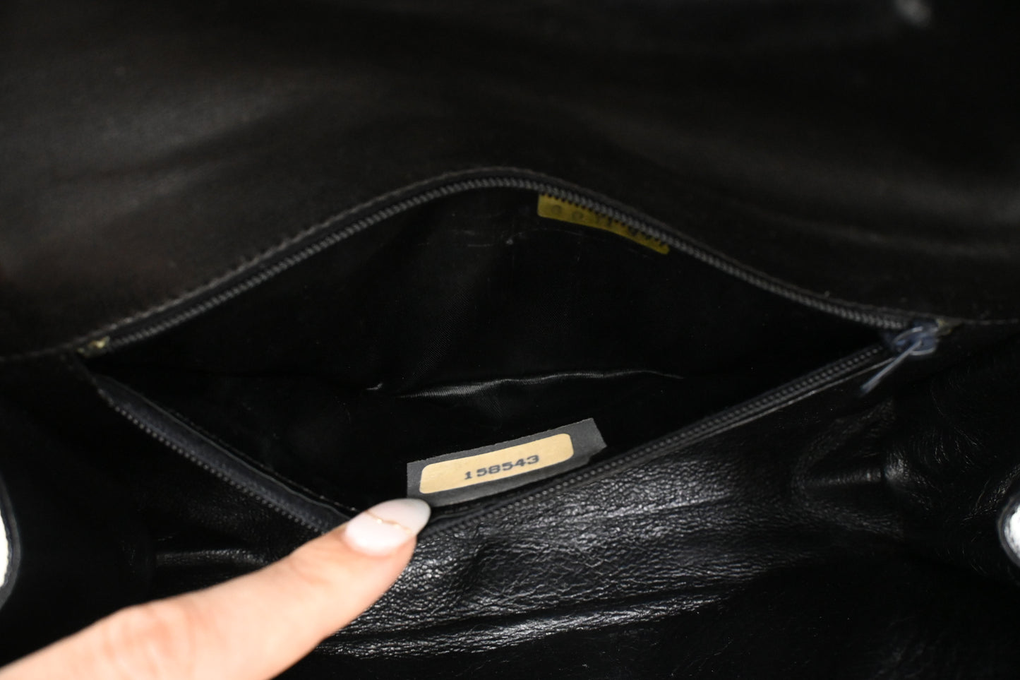 Chanel Chevron Clutch in Black Patent Leather