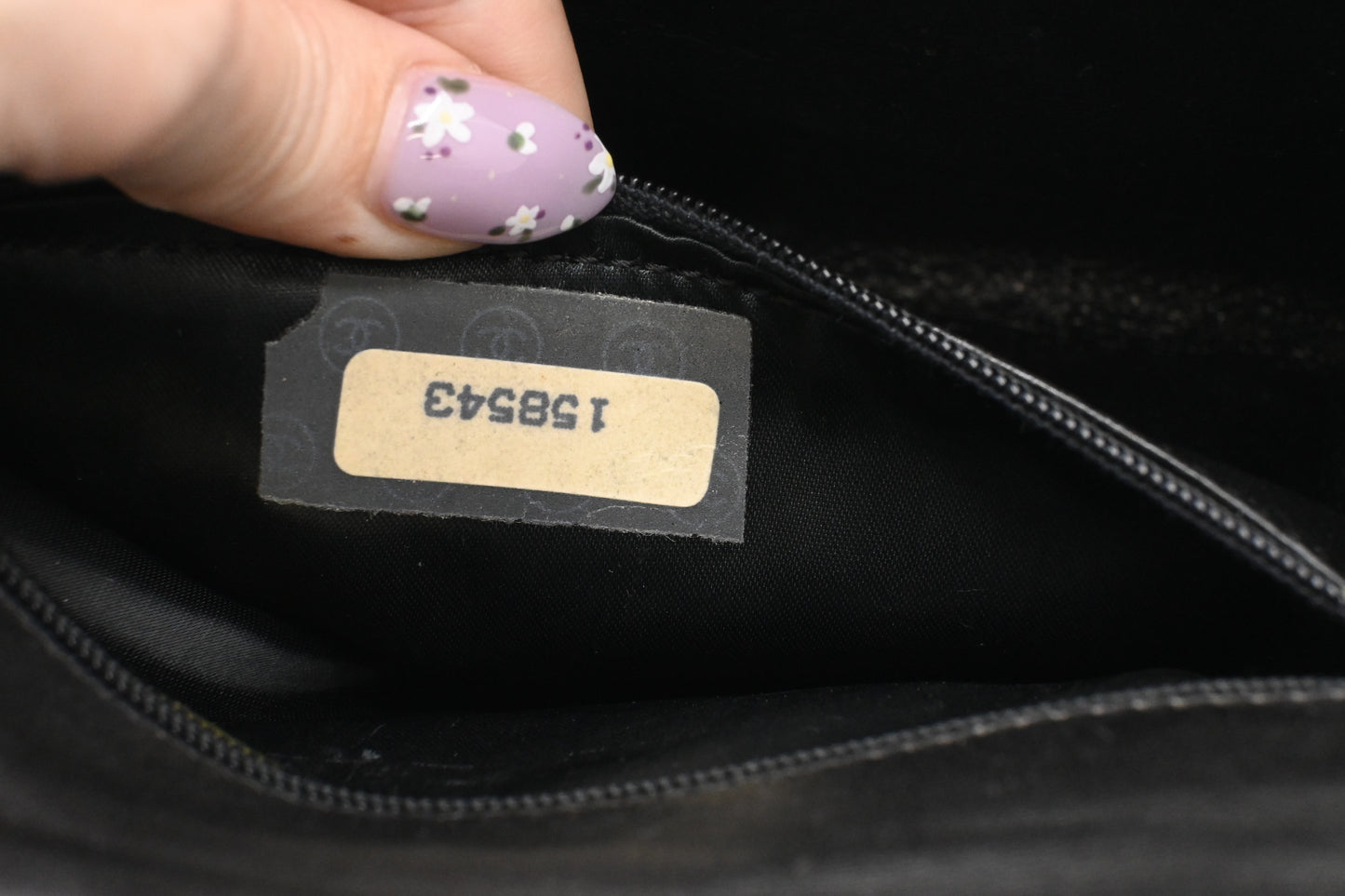 Chanel Chevron Clutch in Black Patent Leather