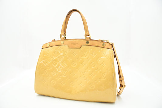 Louis Vuitton Brea MM in Yellow Vernis Leather