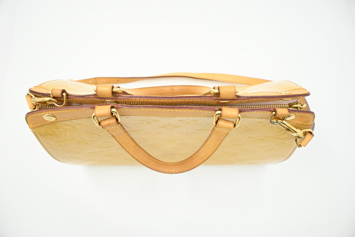 Louis Vuitton Brea MM in Yellow Vernis Leather