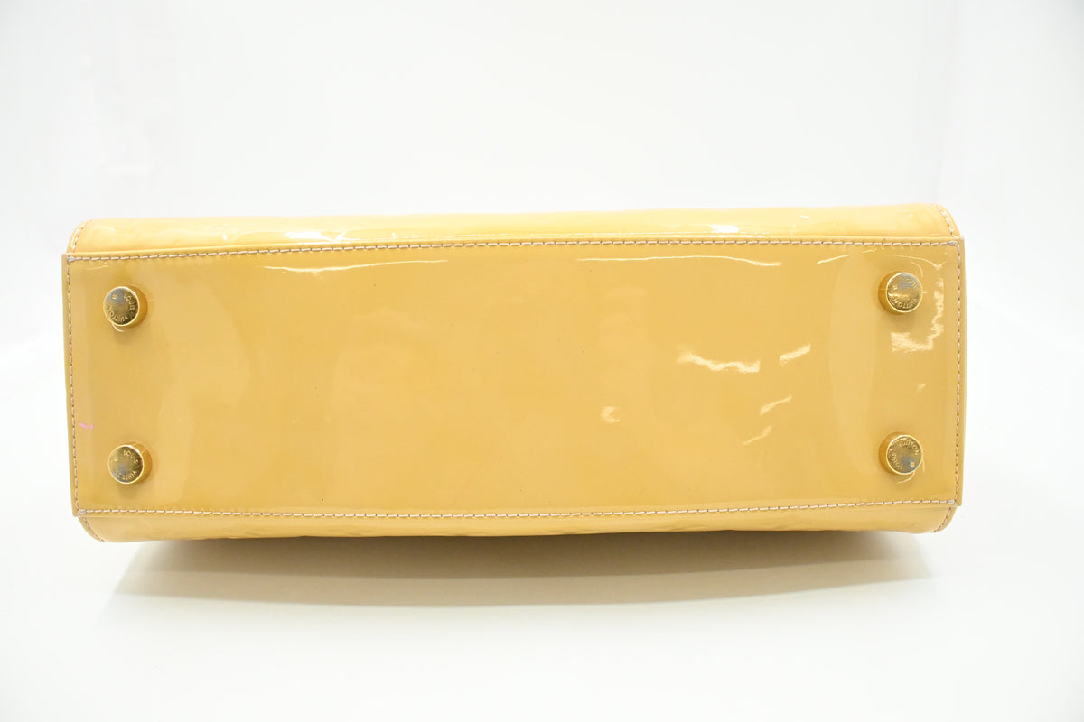 Louis Vuitton Brea MM in Yellow Vernis Leather