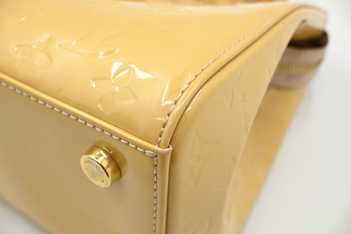 Louis Vuitton Brea MM in Yellow Vernis Leather