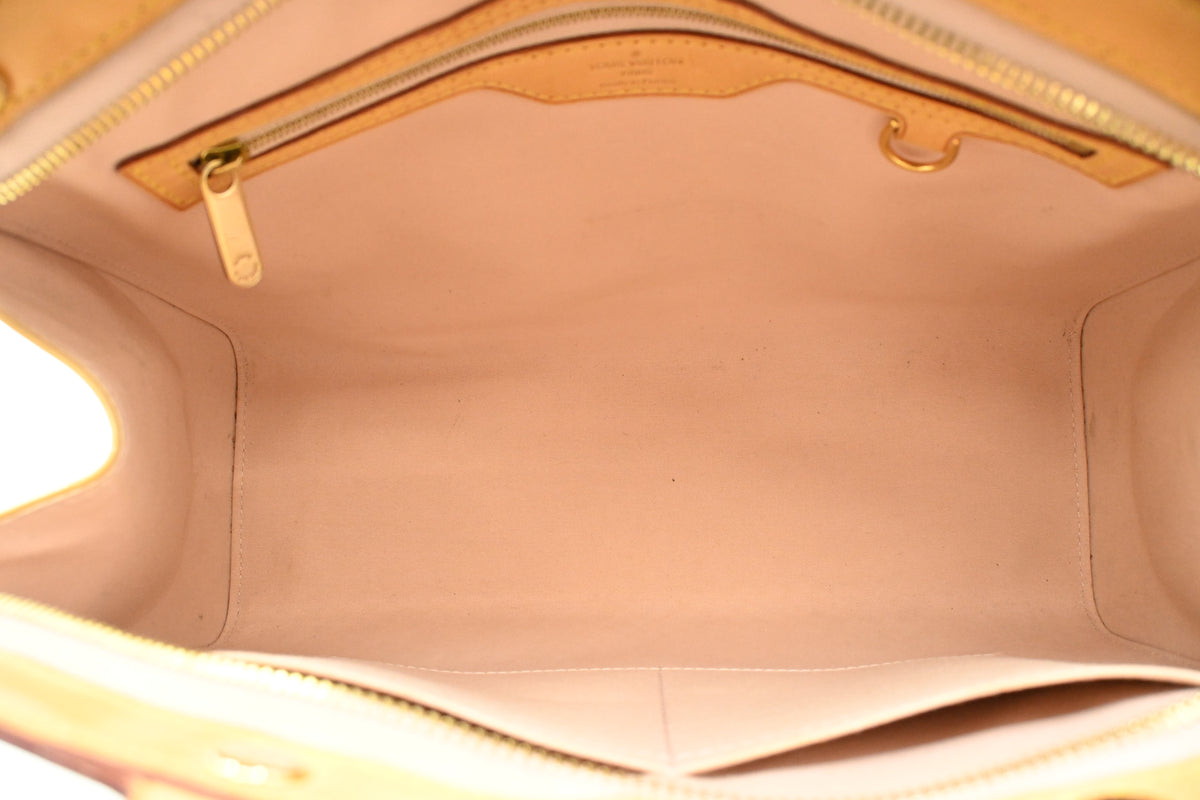 Louis Vuitton Brea MM in Yellow Vernis Leather