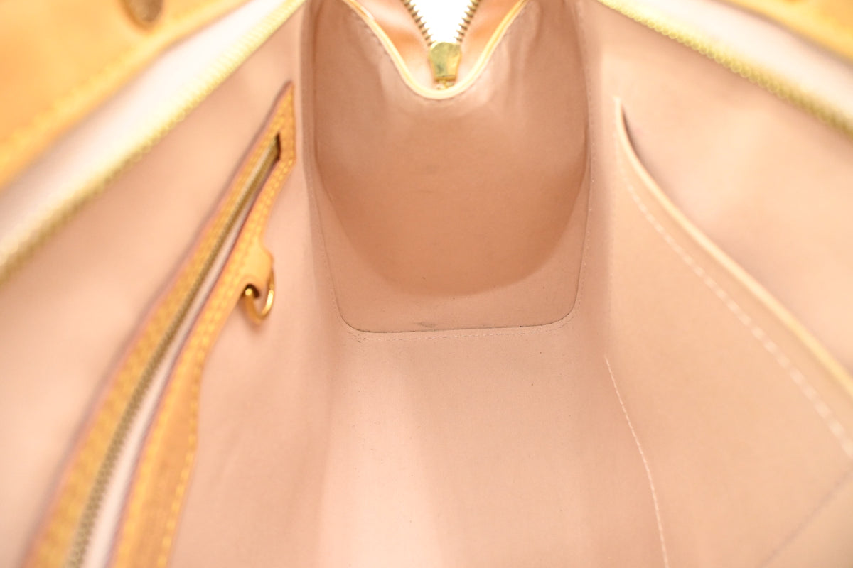 Louis Vuitton Brea MM in Yellow Vernis Leather
