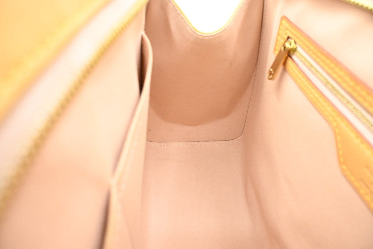 Louis Vuitton Brea MM in Yellow Vernis Leather