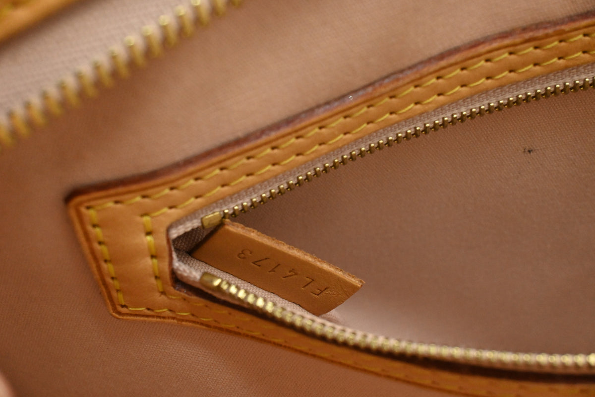 Louis Vuitton Brea MM in Yellow Vernis Leather