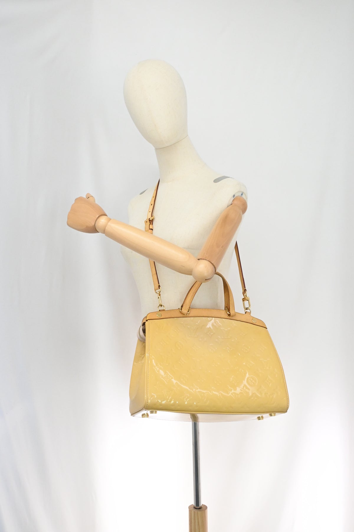 Louis Vuitton Brea MM in Yellow Vernis Leather