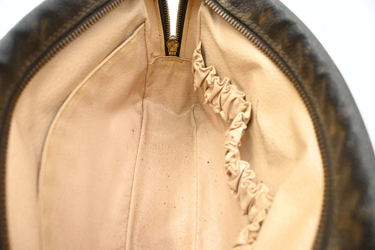 Louis Vuitton Trousse 23 in Monogram Canvas