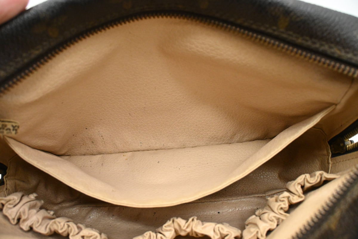 Louis Vuitton Trousse 23 in Monogram Canvas