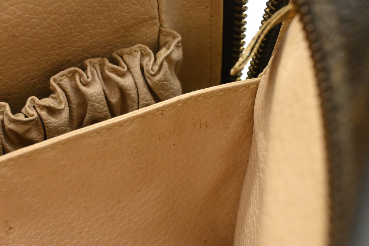 Louis Vuitton Trousse 23 in Monogram Canvas